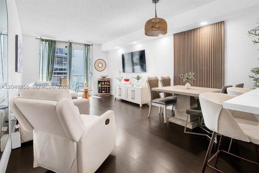 Welcome to this bright and inviting 2-bedroom, 1-bathroom condo - photo 2