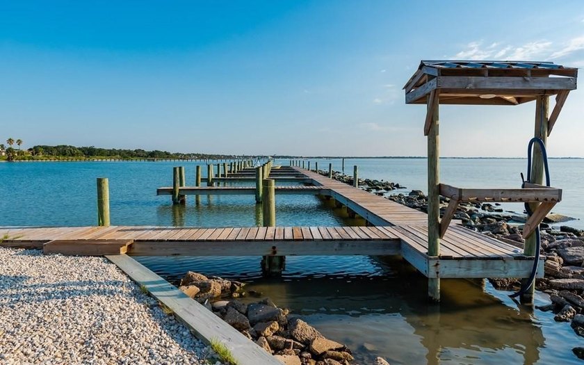The Landing at Redfish Point is a gated coastal enclave where - photo 15