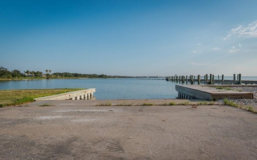 The Landing at Redfish Point is a gated coastal enclave where - photo 16