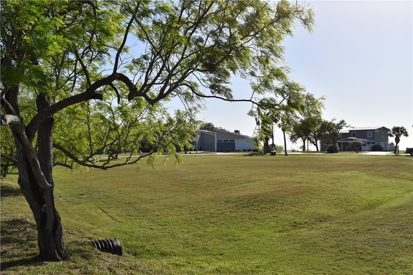 The Landing at Redfish Point is a gated coastal enclave where - photo 23