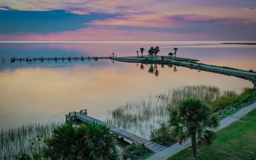The Landing at Redfish Point is a gated coastal enclave where - photo 24