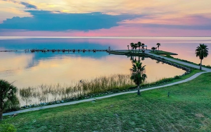 The Landing at Redfish Point is a gated coastal enclave where - photo 25