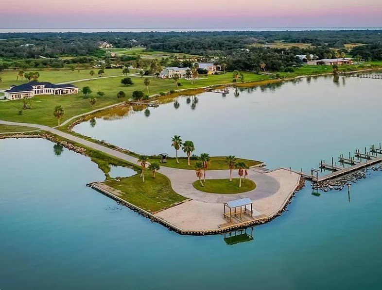 The Landing at Redfish Point is a gated coastal enclave where - photo 27