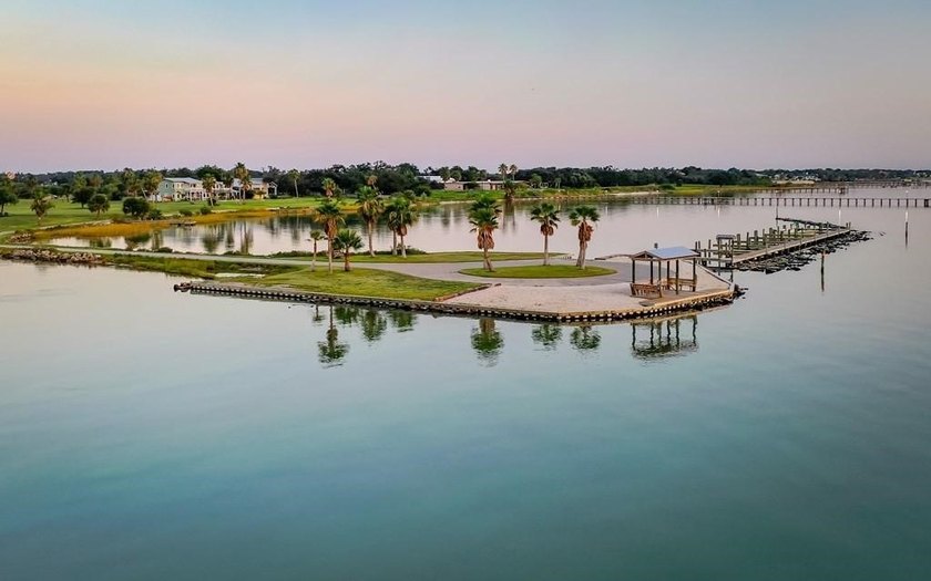 The Landing at Redfish Point is a gated coastal enclave where - photo 28