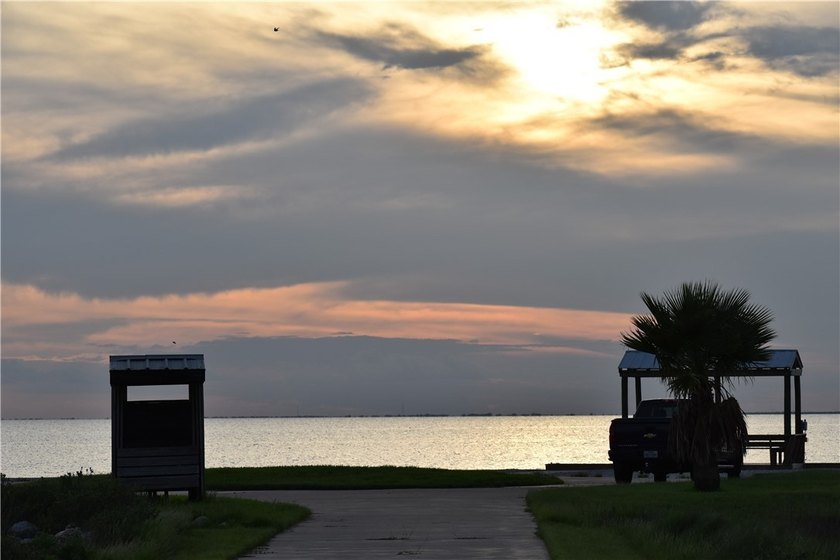 The Landing at Redfish Point is a gated coastal enclave where - photo 30