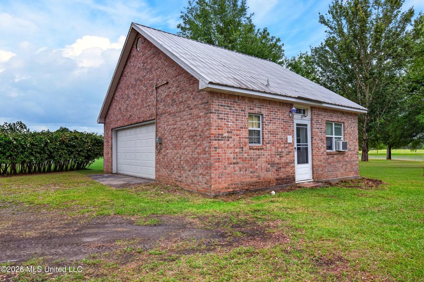 Escape to nearly three acres of serene privacy without - photo 2