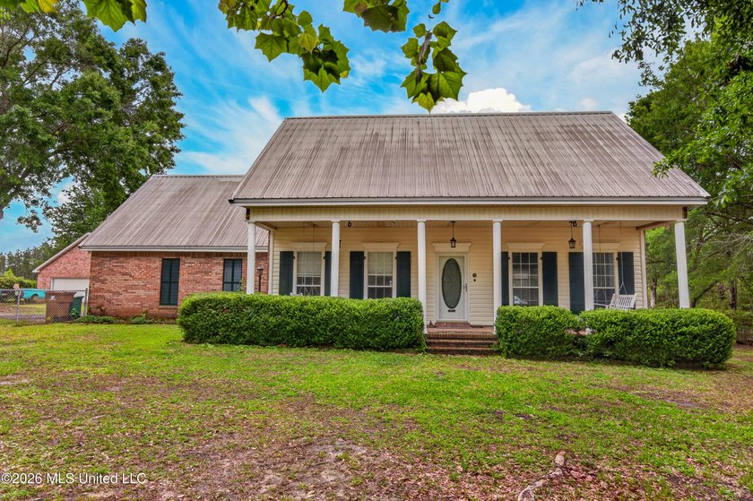 Escape to nearly three acres of serene privacy without - photo 3