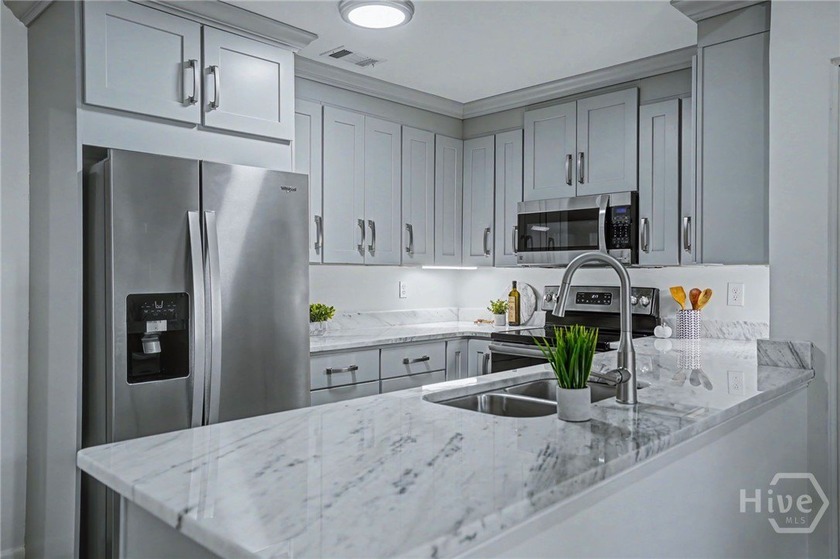 Welcome to effortless, maintenance-free living in The Landings - photo 6