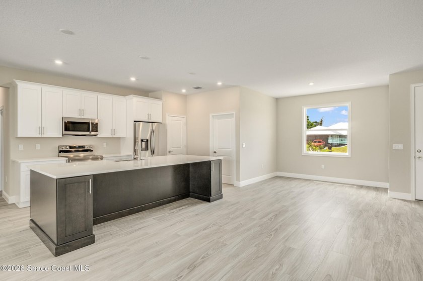 New Construction Custom Home in Desirable Port Malabar Unit 50 - photo 11