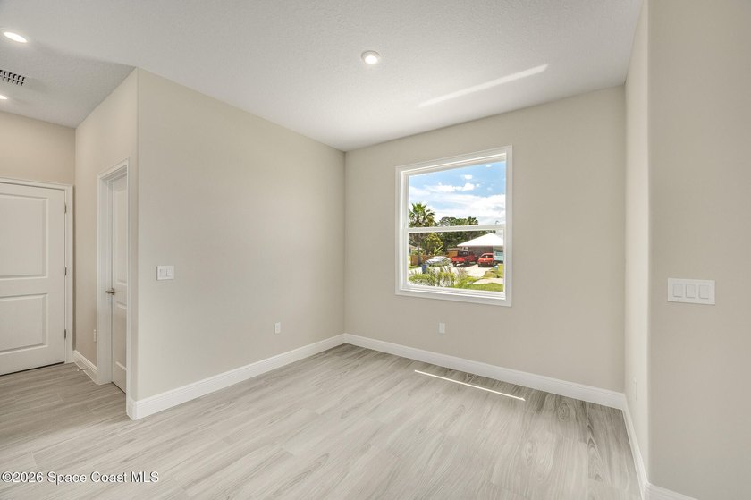New Construction Custom Home in Desirable Port Malabar Unit 50 - photo 13