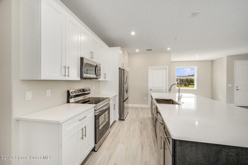 New Construction Custom Home in Desirable Port Malabar Unit 50 - photo 19