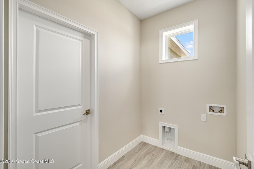 New Construction Custom Home in Desirable Port Malabar Unit 50 - photo 30