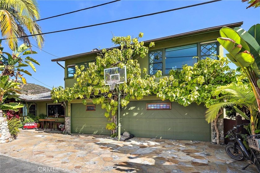 This beautifully maintained 4-bedroom, 3-bath home captures the - photo 4