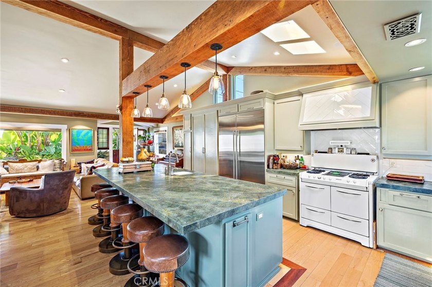 This beautifully maintained 4-bedroom, 3-bath home captures the - photo 8