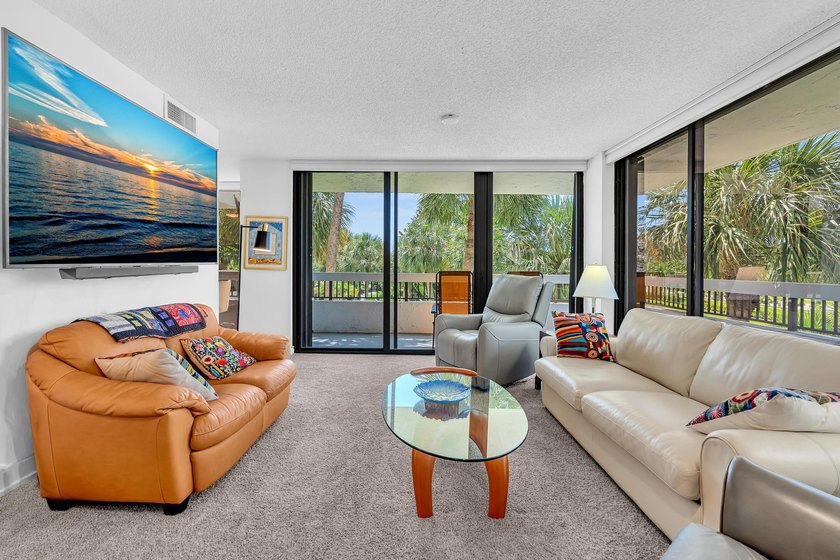 Gorgeous corner 3/2 with wraparound balcony facing southeast for - photo 9