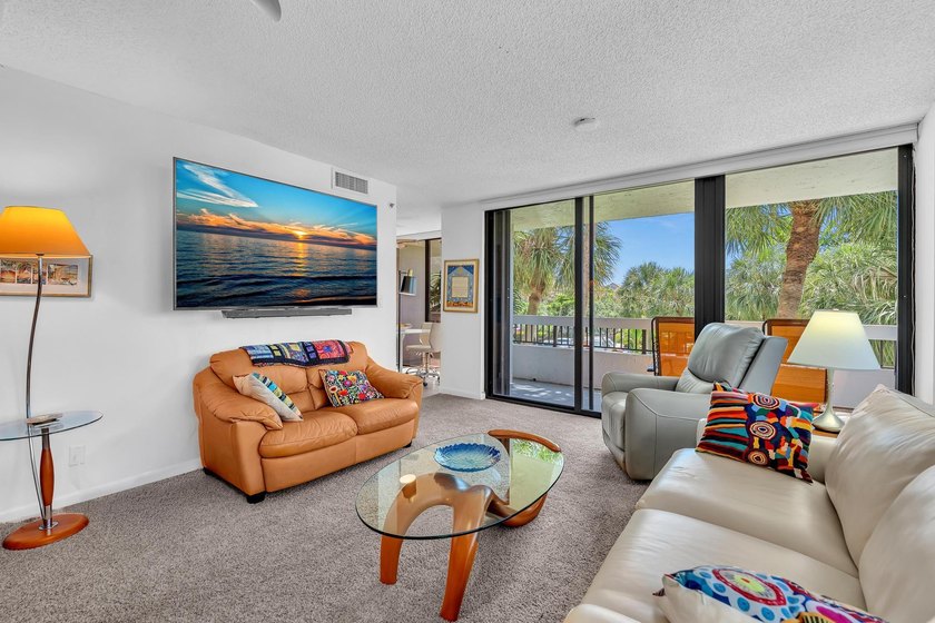 Gorgeous corner 3/2 with wraparound balcony facing southeast for - photo 10
