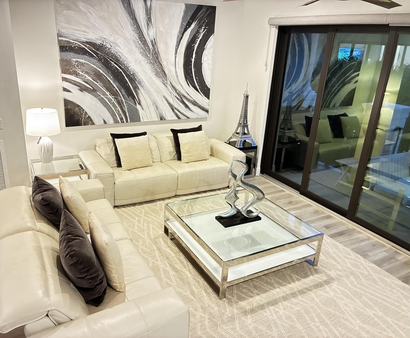 Welcome to this stunning tri-level Mediterranean-style townhome - photo 9