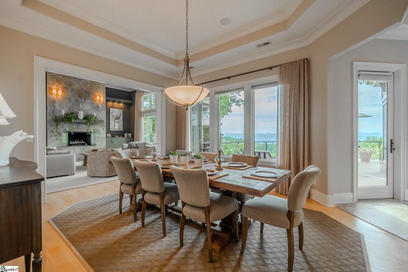 Some homes have a view. This one has a horizon. Sited on one of - photo 12