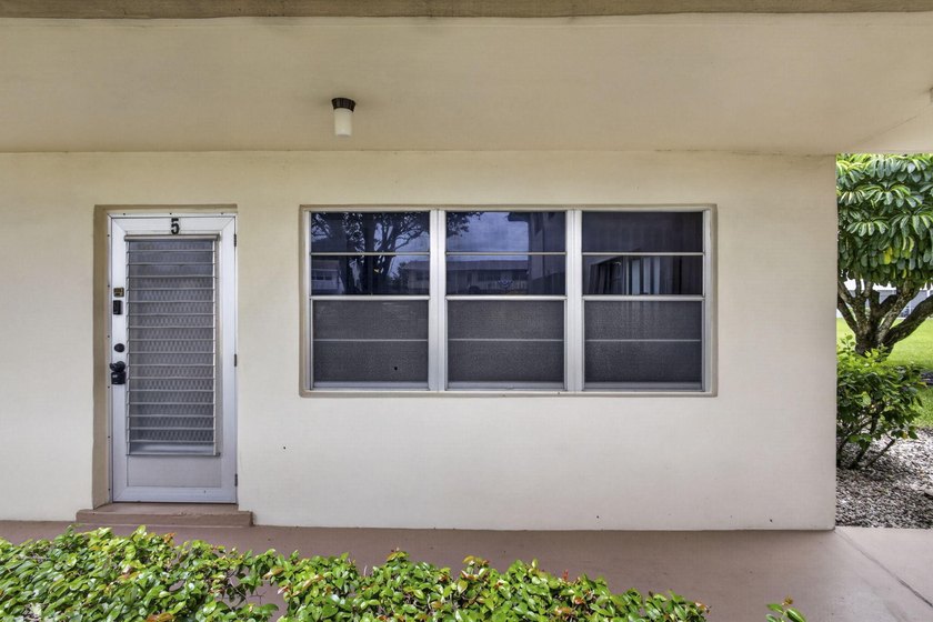 Rare first-floor corner end unit offering extra privacy - photo 2