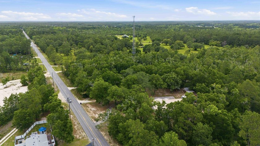 Step into a bright, split-layout ranch where the 2023 kitchen - photo 21