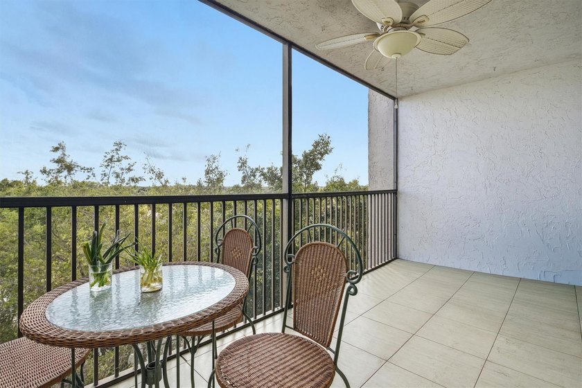 This spacious 3-bedroom, 2.5-bath corner unit in the gated *18th - photo 3