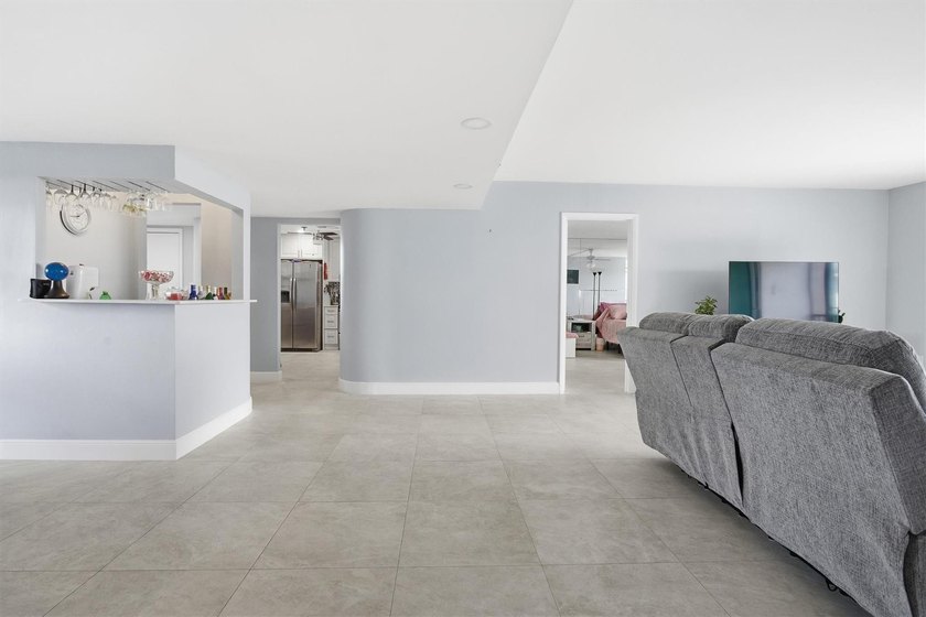 This spacious 3-bedroom, 2.5-bath corner unit in the gated *18th - photo 7