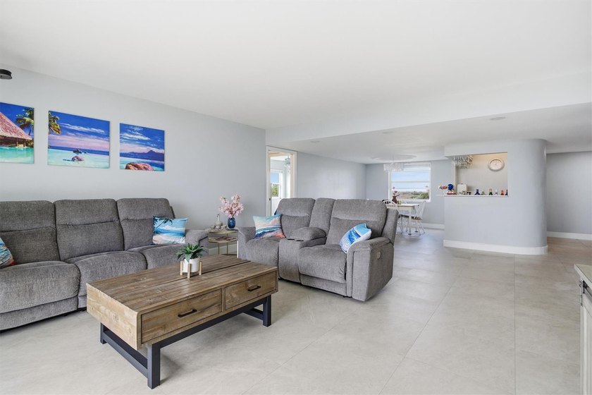 This spacious 3-bedroom, 2.5-bath corner unit in the gated *18th - photo 8