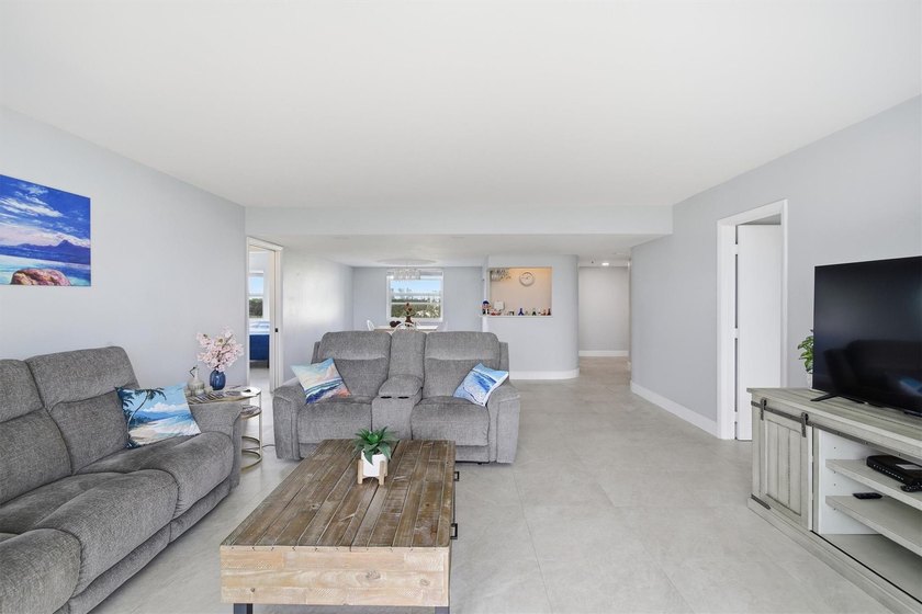This spacious 3-bedroom, 2.5-bath corner unit in the gated *18th - photo 9