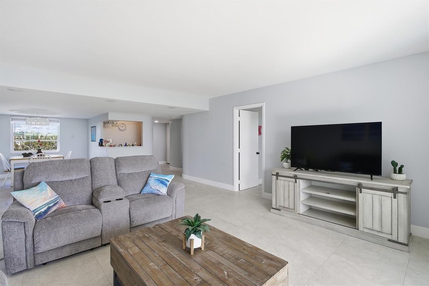 This spacious 3-bedroom, 2.5-bath corner unit in the gated *18th - photo 10