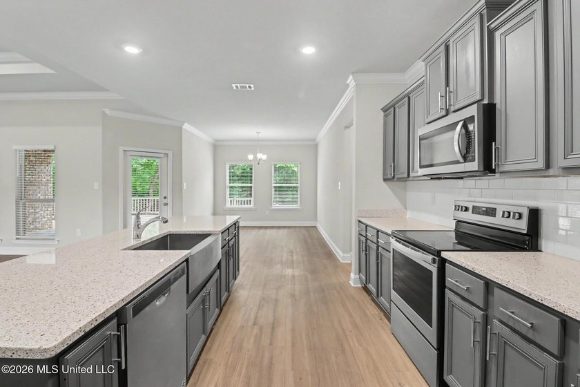This well-maintained 6-year-old D.R. Horton Parker Plan in the - photo 12
