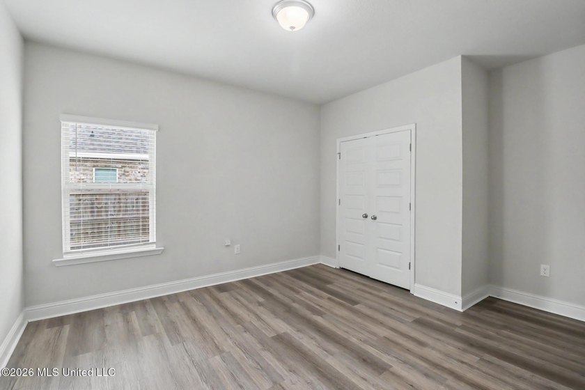 This well-maintained 6-year-old D.R. Horton Parker Plan in the - photo 15