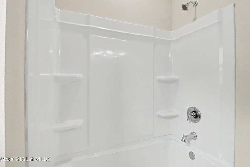 This well-maintained 6-year-old D.R. Horton Parker Plan in the - photo 27