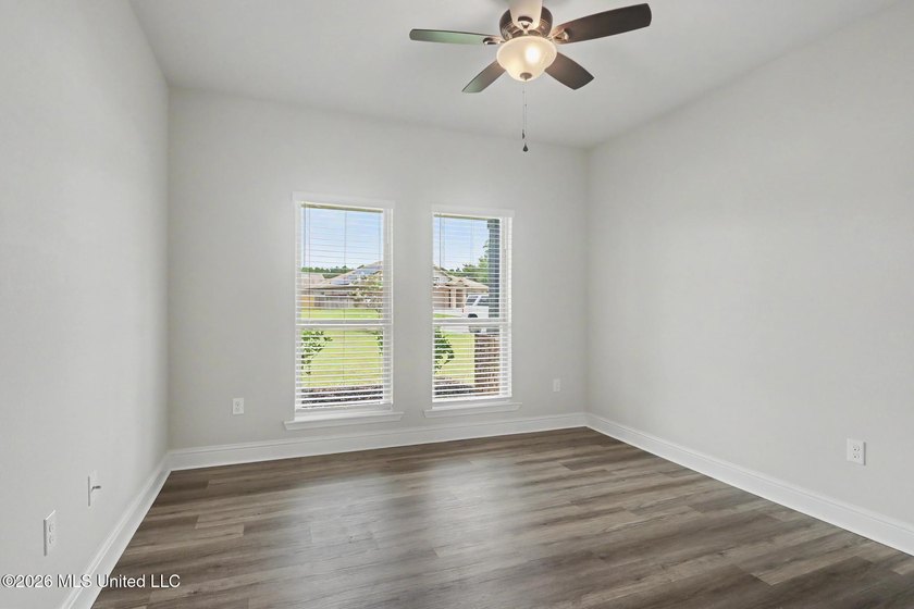 This well-maintained 6-year-old D.R. Horton Parker Plan in the - photo 29