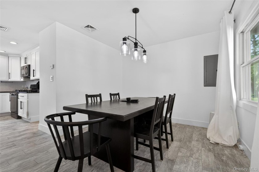A Diamond, Completely Remodeled Colonial Located Mid-Block in - photo 11