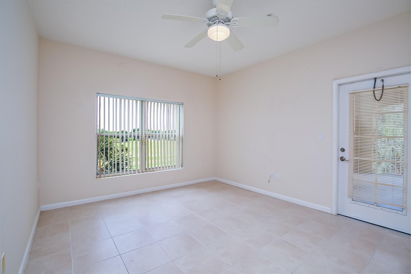 Discover easy coastal living in this beautifully maintained - photo 11