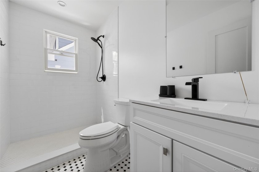 A Diamond, Completely Remodeled Colonial Located Mid-Block in - photo 13
