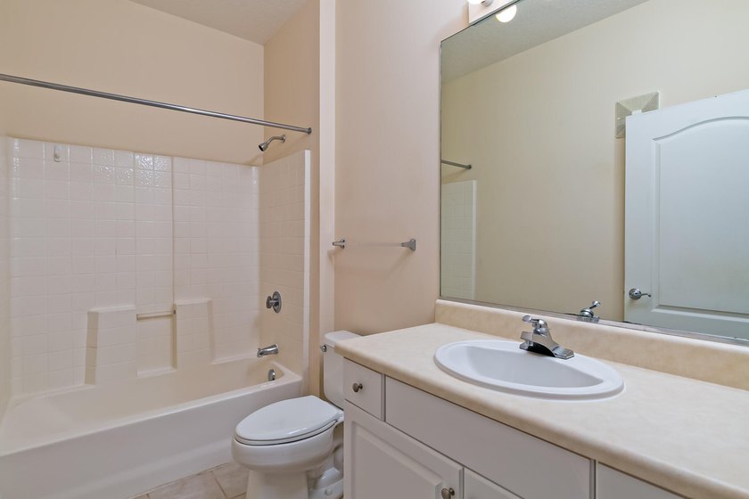 Discover easy coastal living in this beautifully maintained - photo 14