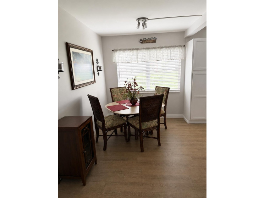 Beautiful first floor condo featuring an updated kitchen and - photo 7
