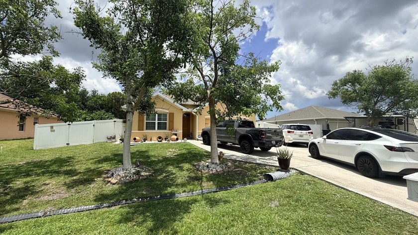 Welcome to this charming 4-bedroom, 2-bathroom home located in - photo 2