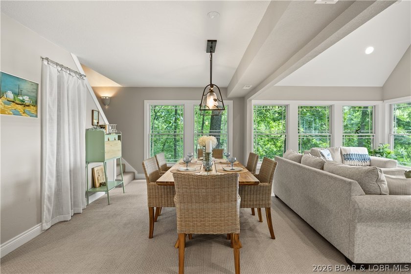 Discover peace and tranquility in this stunning lakefront home - photo 11