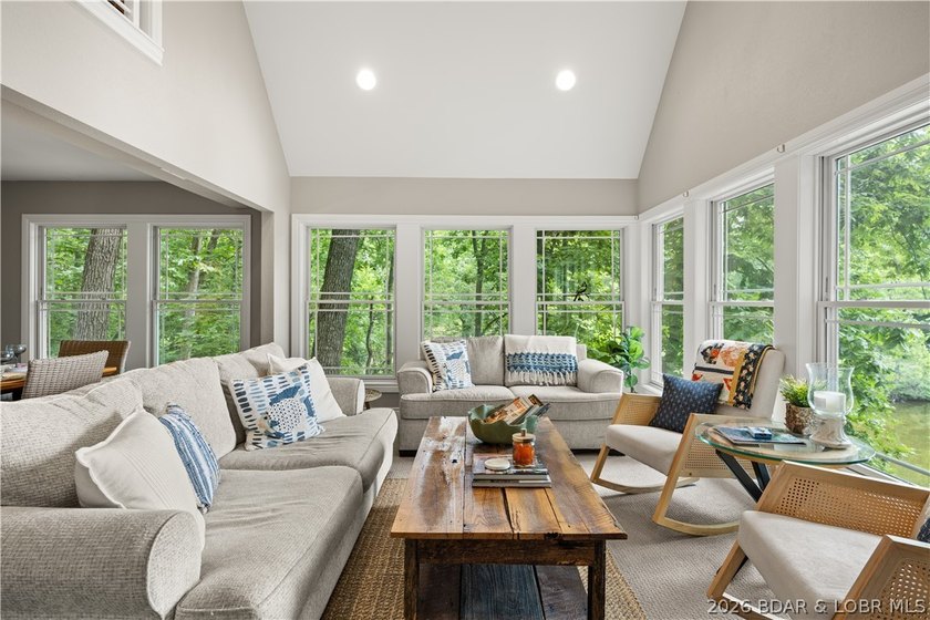 Discover peace and tranquility in this stunning lakefront home - photo 14
