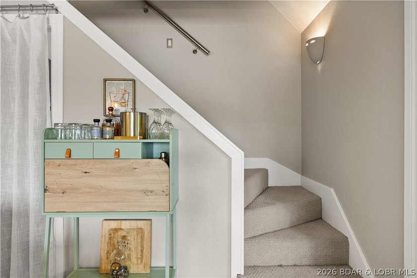 Discover peace and tranquility in this stunning lakefront home - photo 20