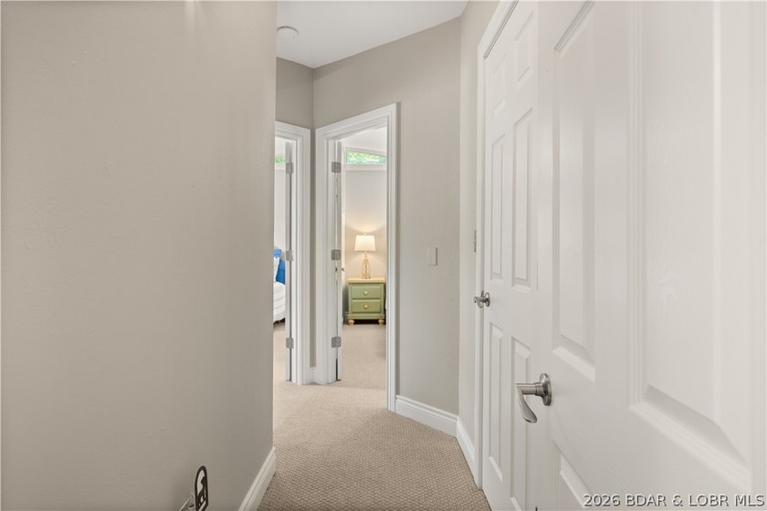 Discover peace and tranquility in this stunning lakefront home - photo 24