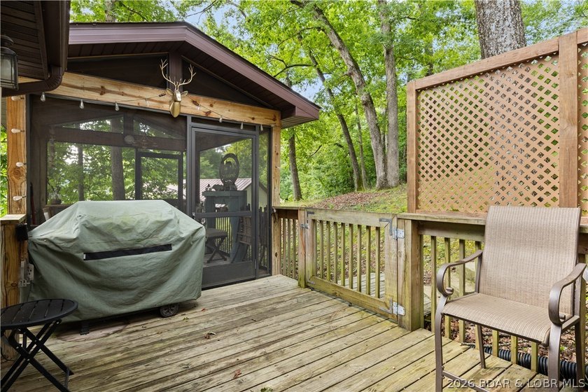 Discover peace and tranquility in this stunning lakefront home - photo 31