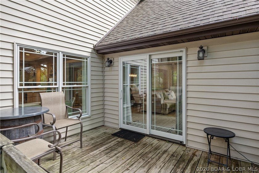 Discover peace and tranquility in this stunning lakefront home - photo 32