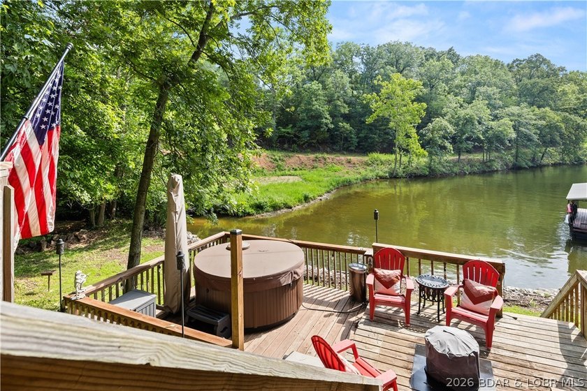 Discover peace and tranquility in this stunning lakefront home - photo 36