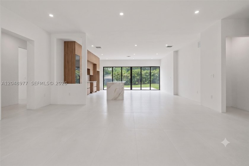 Modern design meets effortless indoor-outdoor living in this - photo 3