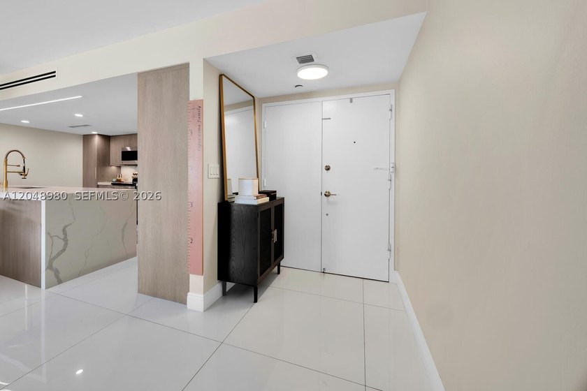 Beautifully remodeled 2-bedroom, 2-bath residence featuring a - photo 2