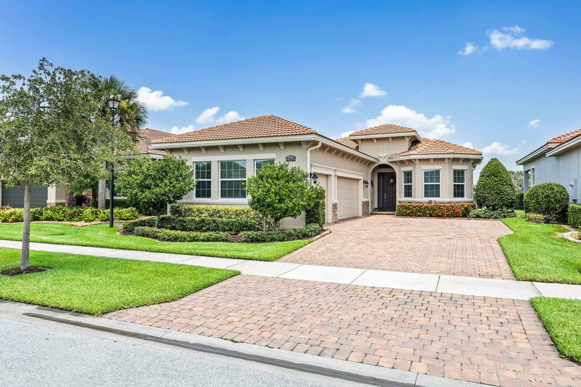 Welcome to 23018 SW Accesi Way, in PGA Verano. This large - photo 2