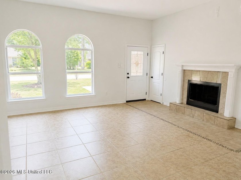 This beautifully updated 4-bedroom, 2-bath home is located in a - photo 3